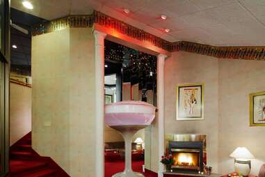 giant champagne class kitsch poconos entertainment resorts room with options including fireplace