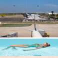 a woman in a pool floating with planes in the background