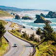 highway winding along an oceanside road