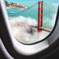 Aerial view of San Francisco Golden Gate Bridge from plane window