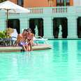 couple at the pool at Biltmore Hotel Miami Coral Gables